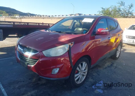 2010 Hyundai Tucson Limited z USA, uszkodzony, nr VIN KM8JUCAC9AU024189